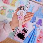 Doll Book – O carte magnetică pentru îmbrăcarea păpușilor slider